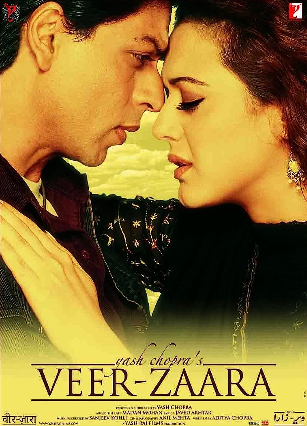 Veer-Zaara (2004) is a timeless and emotionally resonant love saga that transcends borders and religions. The film revolves around Veer Pratap Singh (played by Shah Rukh Khan), a devoted Indian Air Force officer, and Zaara Hayaat Khan (portrayed by Preity Zinta), an enchanting Pakistani woman. Their paths intertwine when Veer comes to Zaara's rescue during a journey, and an unbreakable bond of love forms between them.