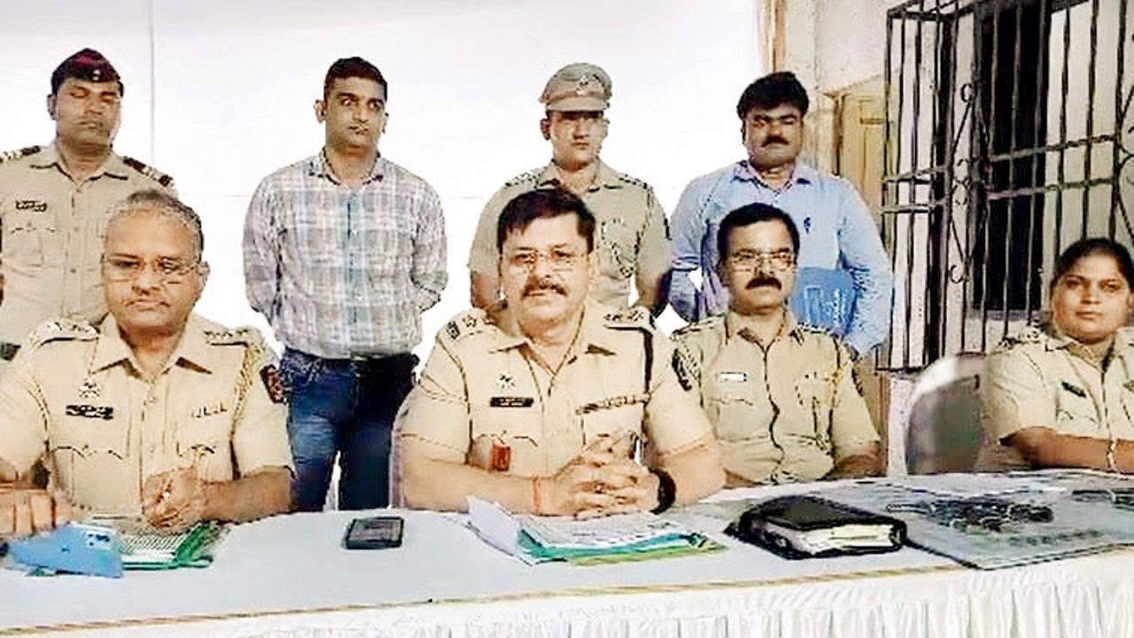DCP Sudhakar Pathare and Anil Padwal, senior inspector of Badlapur police station with the team that detected the truth