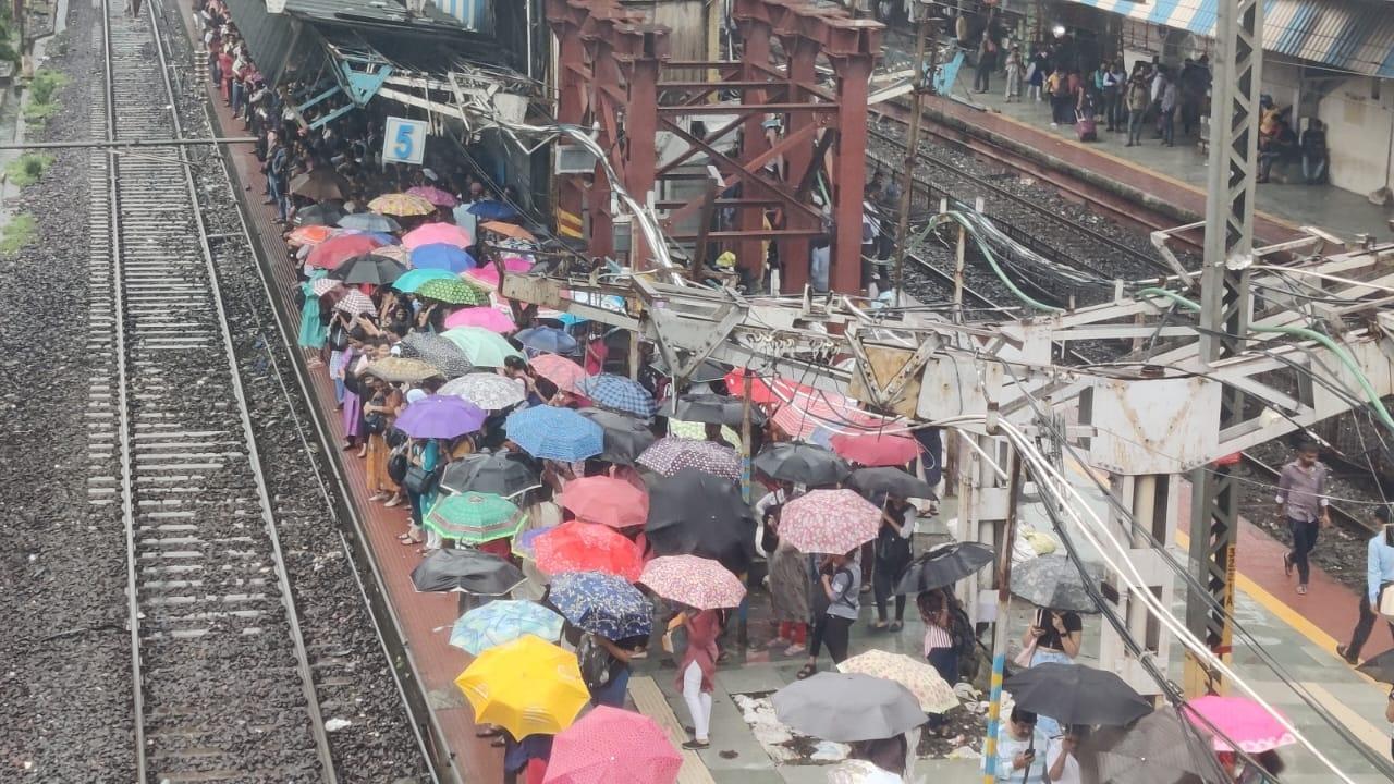 IN PHOTOS: Mumbai local trains affected after heavy rains