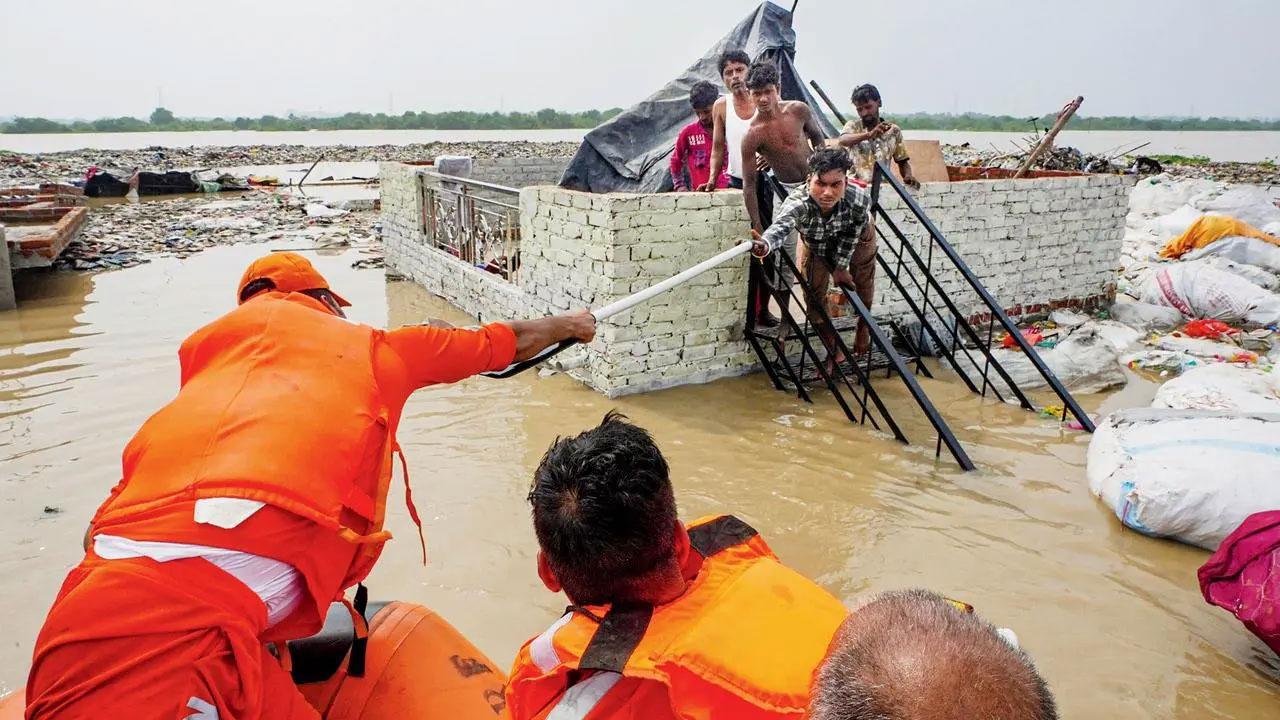 As Yamuna continues to overflow, NDRF carries out rescue operation in Delhi's Pragati Maidan