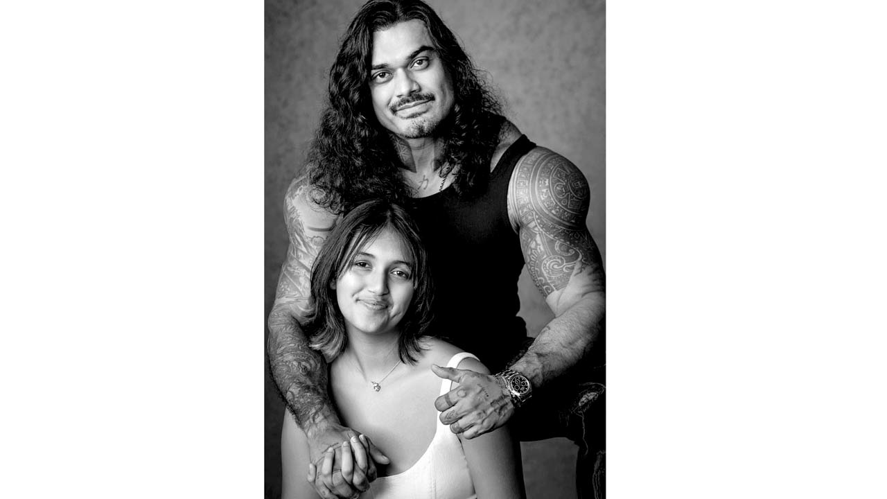 Kasha with dad Nicholai Sachdev, who also coaches the girls