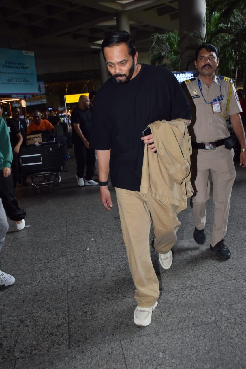He was spotted in beige pants, a black shirt, and a matching beige jacket as he was leaving the airport