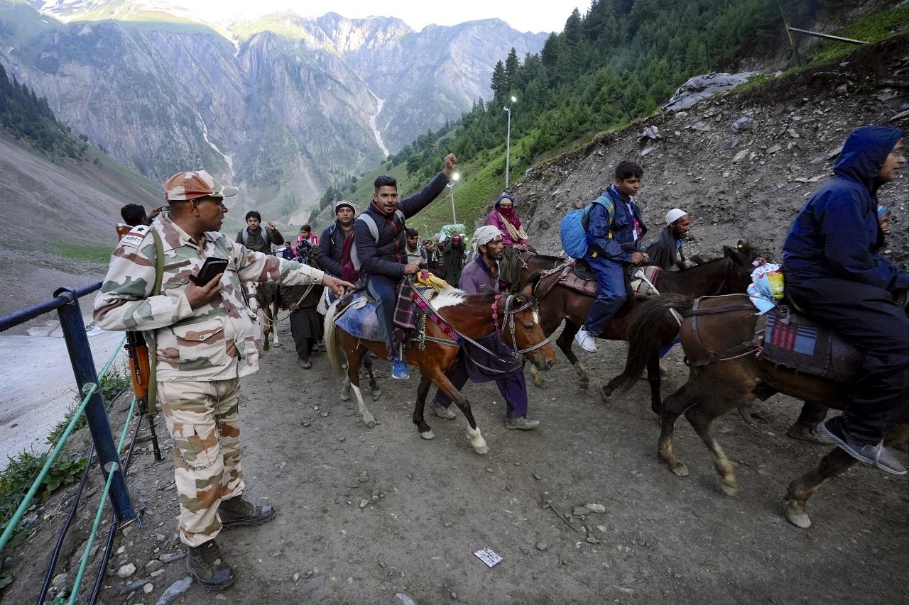 The officials said 2,557 devotees, including 379 women and 226 sadhus, left in 104 vehicles for Pahalgam
