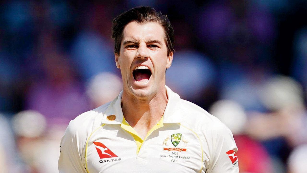 Australia’s Pat Cummins celebrates the wicket of England’s Joe Root yesterday
