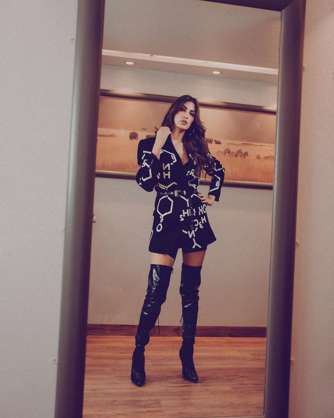 Unleashing the power of black: Rhea Chakraborty's enchanting style.