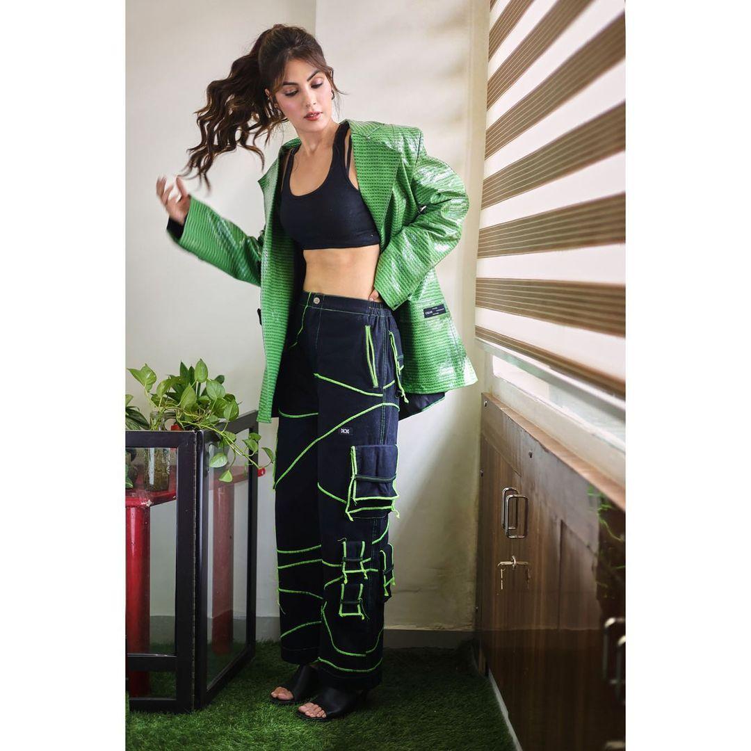 Rhea Chakraborty's captivating black ensembles with a chic green blazer.