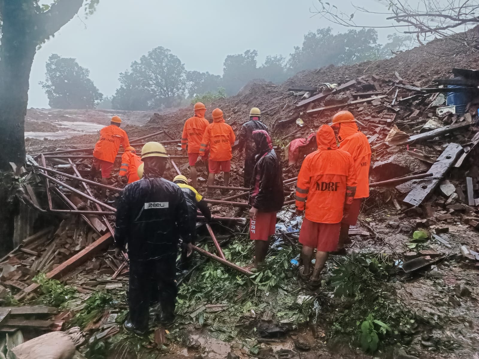The village has around 50 houses, of which 17 were buried under the landslide, the official said. The landslide followed torrential rains in the area