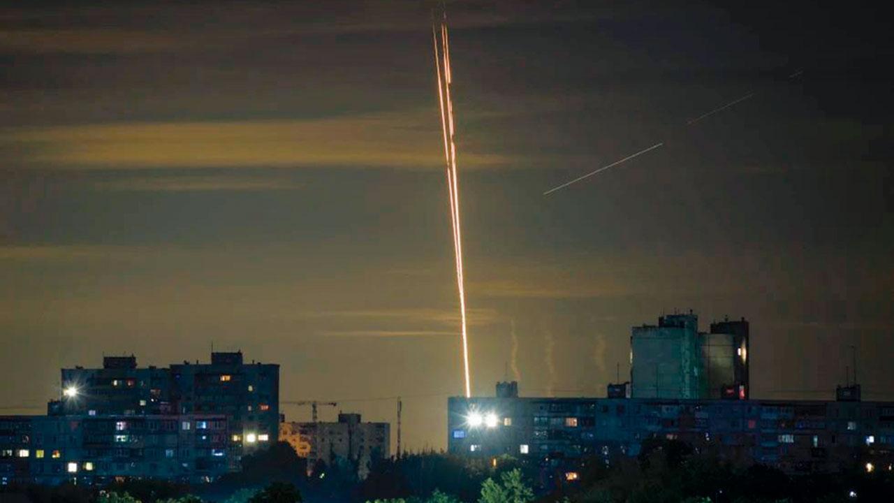 Russian rockets launched, as seen from Kharkiv. Pic/AP