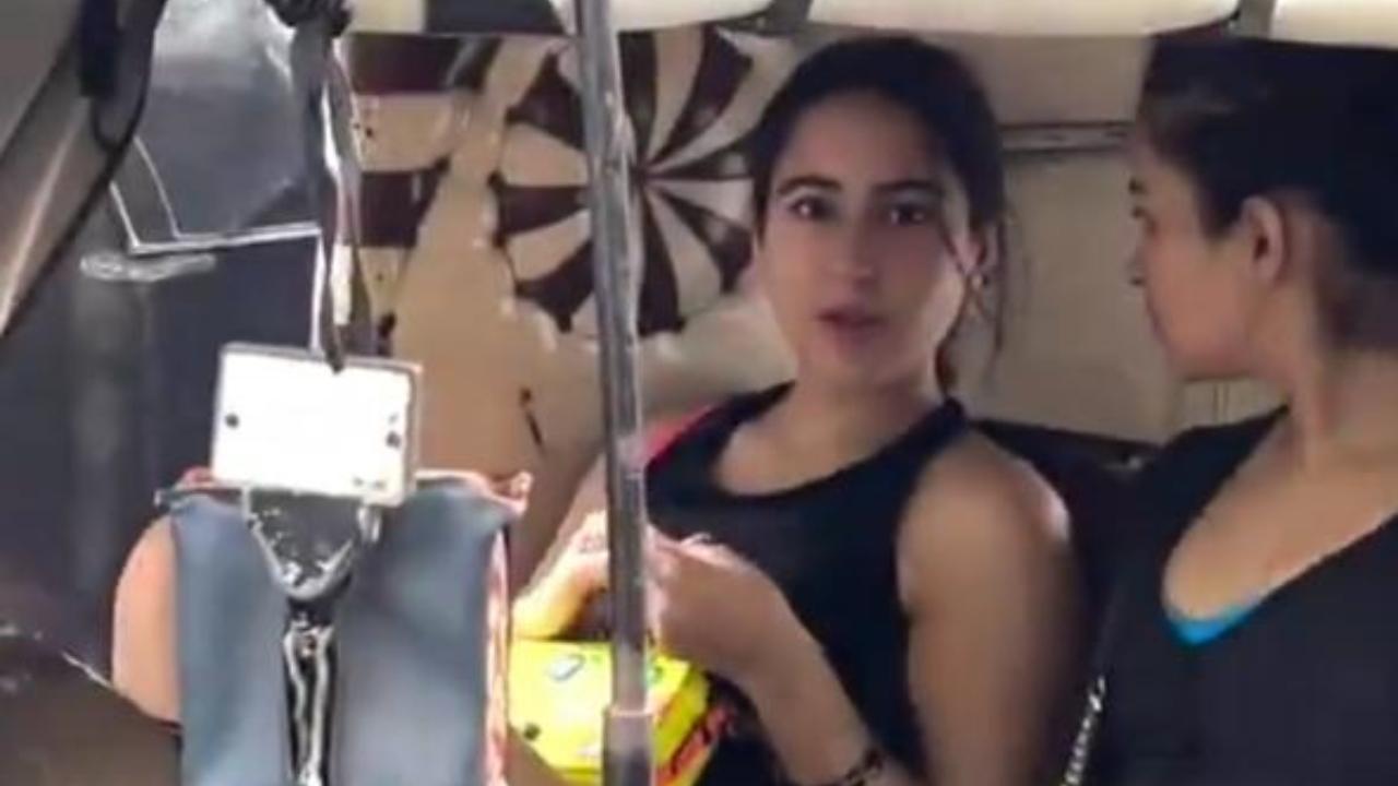 Sara Ali Khan surprised as paparazzi track her even in traffic jam amid Mumbai rains