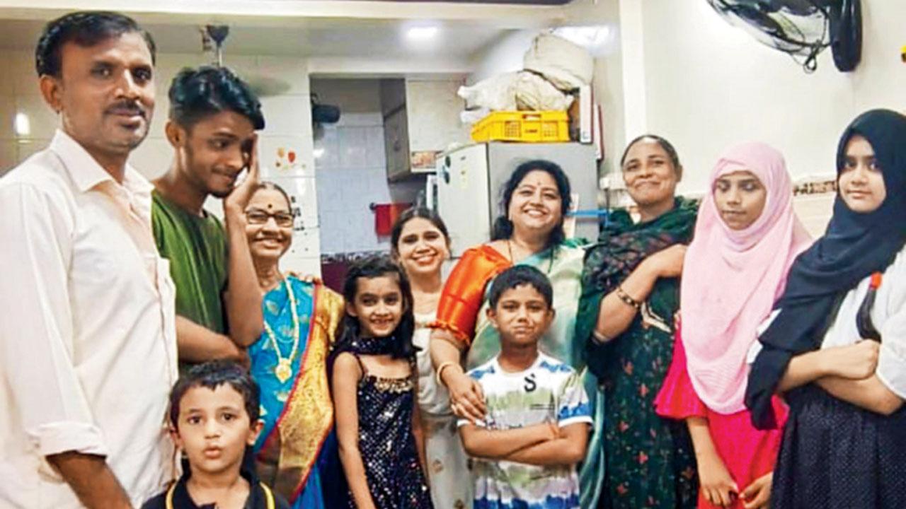 Shraddha Zagade with her staff and family members who help her run the Siddhivinayak Poli Bhaji Kendra in Thane