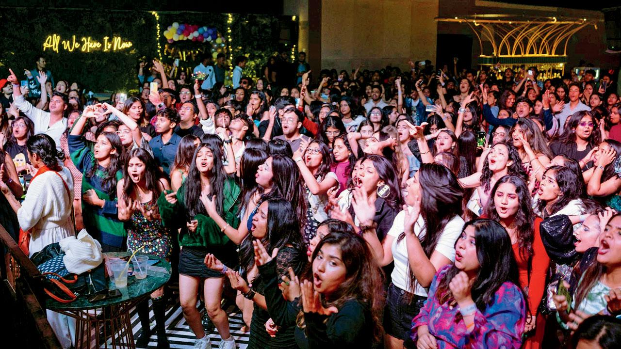 Fans of Taylor Swift celebrate at a previous event in Mumbai