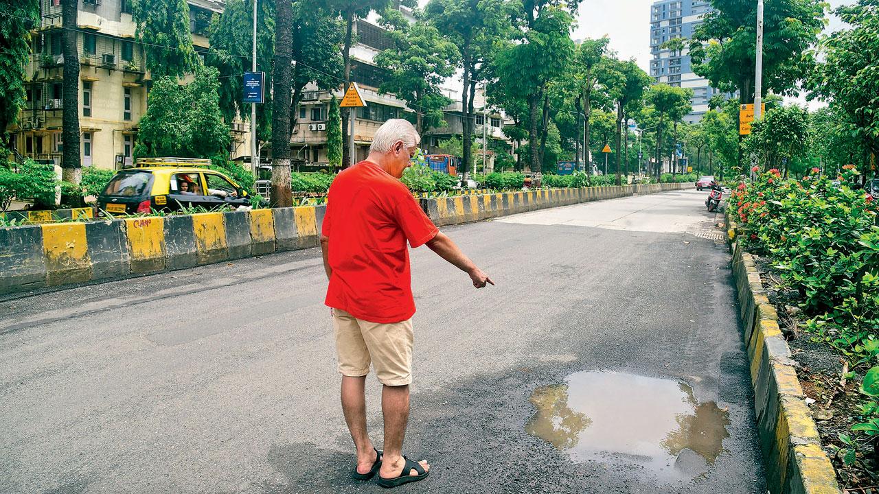 Wadala resident pointing out the shoddy patchwork