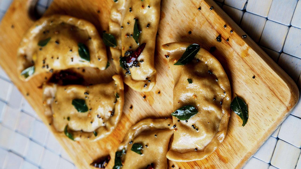 Bihari pitha, made with wheat flour and stuffed with dal, gives the dish an interesting texture 