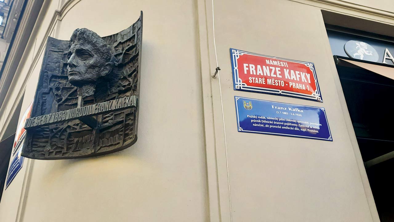 A bust of Kafka and a plaque were added to the new building. Across the street, there is a small exhibition that celebrates the writer. Kafka (1883-1924) was a Prague-born German-speaking Jewish writer whose novels express the alienation of 20th century