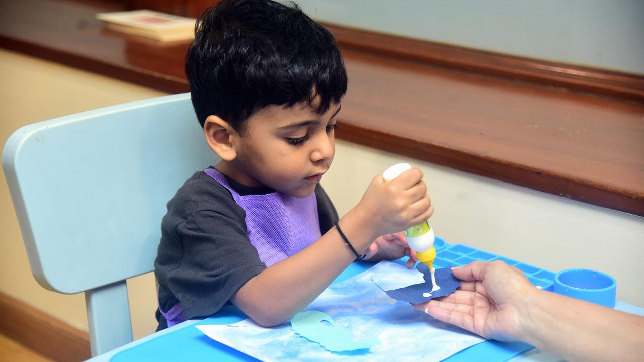Dev pastes cut-outs of seahorse after he learnt about the animal