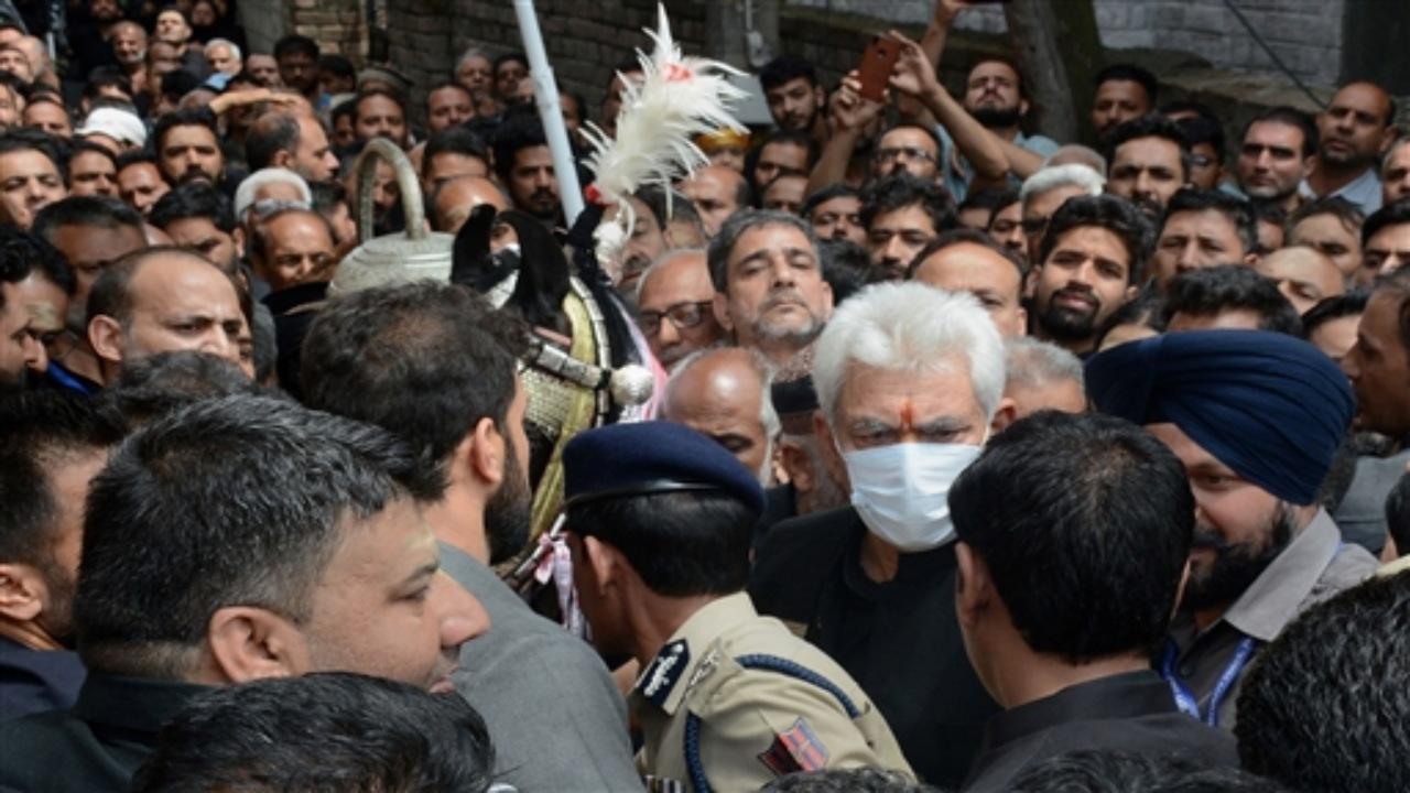 Sinha during his outing interacted with mourners, and also distributed refreshments among them, officials said.
