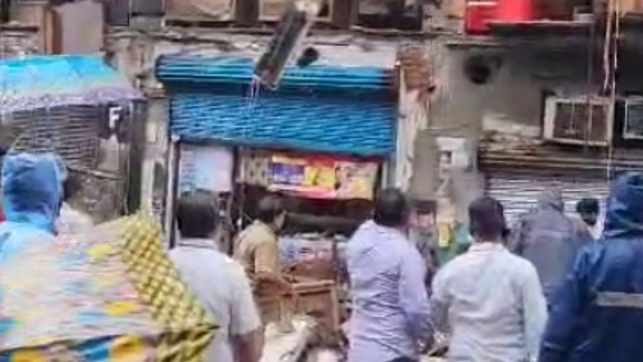 The collapsed structure's front portion had a lot of shops, the official said