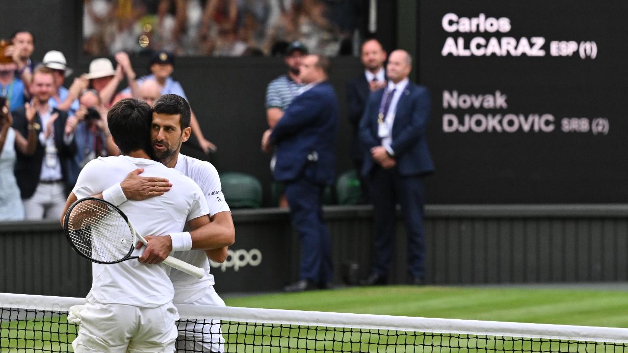 Djokovic's record 35th Grand Slam final was Alcaraz's second. Yet it was Alcaraz who won a 32-point, 25-minute mini-masterpiece of a game on the way to taking the third set. And it was Alcaraz who moved out front for good by breaking to go up 2-1 in the fifth with a backhand passing winner. Djokovic, who fell during the point but quickly popped back up, reacted by slamming his racket into the net post, letting go on impact. He destroyed his equipment and earned a code violation from chair umpire Fergus Murphy.