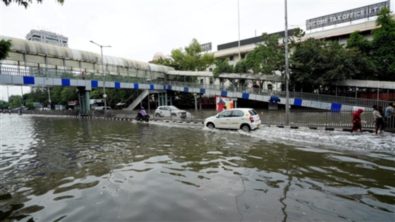 Following the incessant rains in the National Capital, water-logging was reported in several areas adding to the woes of the commuters. Photos: PTI