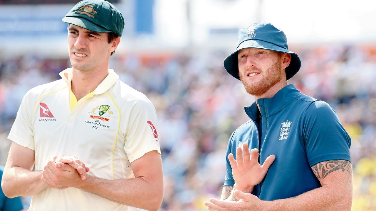 England captain Ben Stokes (right) with his Australian counterpart  Pat Cummins after the hosts’ victory at Leeds yesterday