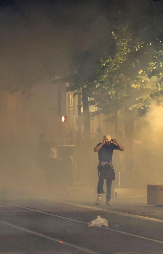 Hundreds of officers with batons and shields were seen guarding places