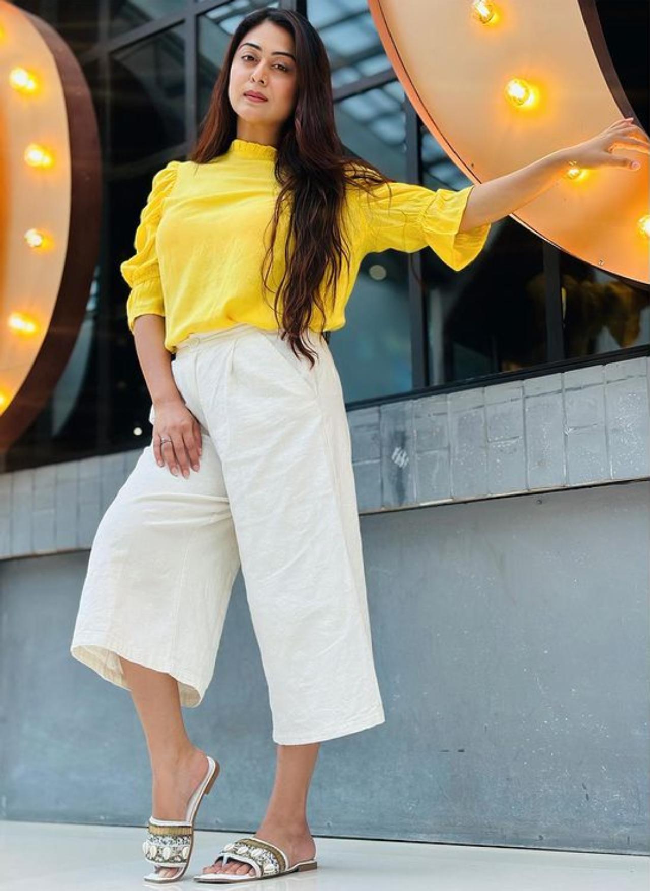 Falaq Naaz opts for a comfortable palazzo and a bright yellow top