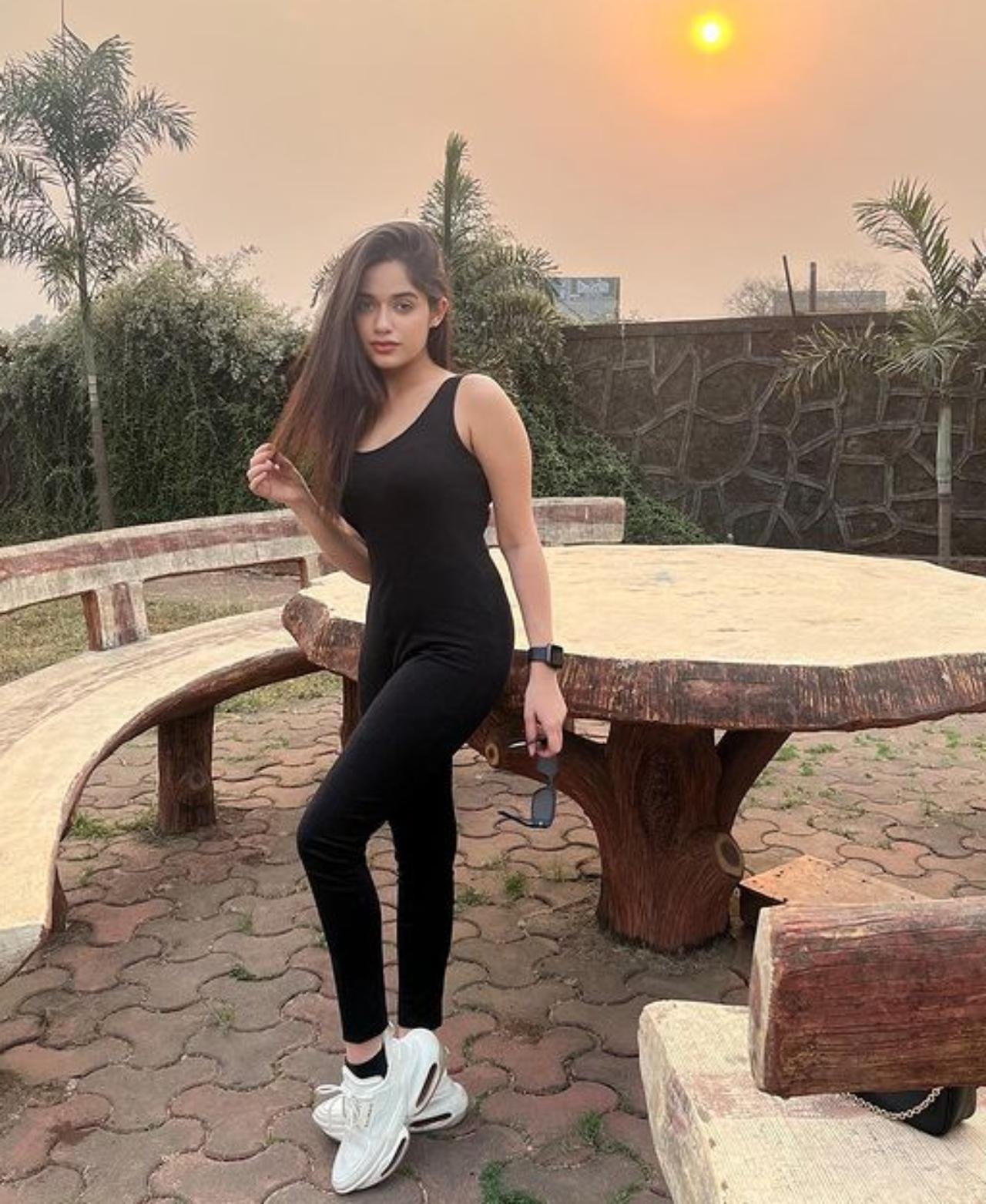 Jannat Zubair looks absolutely stunning in this black sporty outfit that she has paired with white sneakers