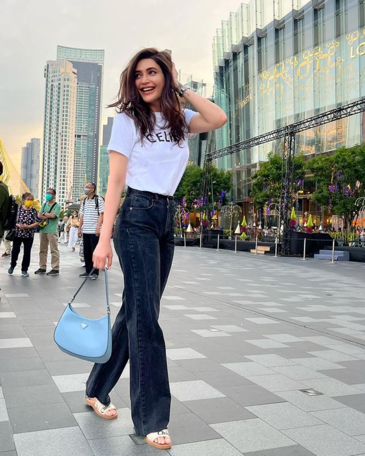 Let's take some fashion tips from Karishma Tanna as she slays the simple t-shirt and black jeans like a queen