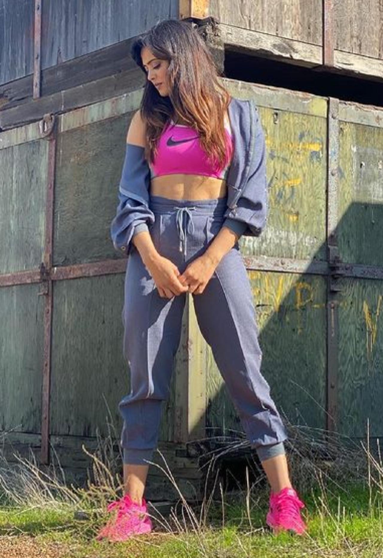 The timeless beauty Shweta Tiwari paired a blue tracksuit with a pink crop top and a matching pair of sneakers
