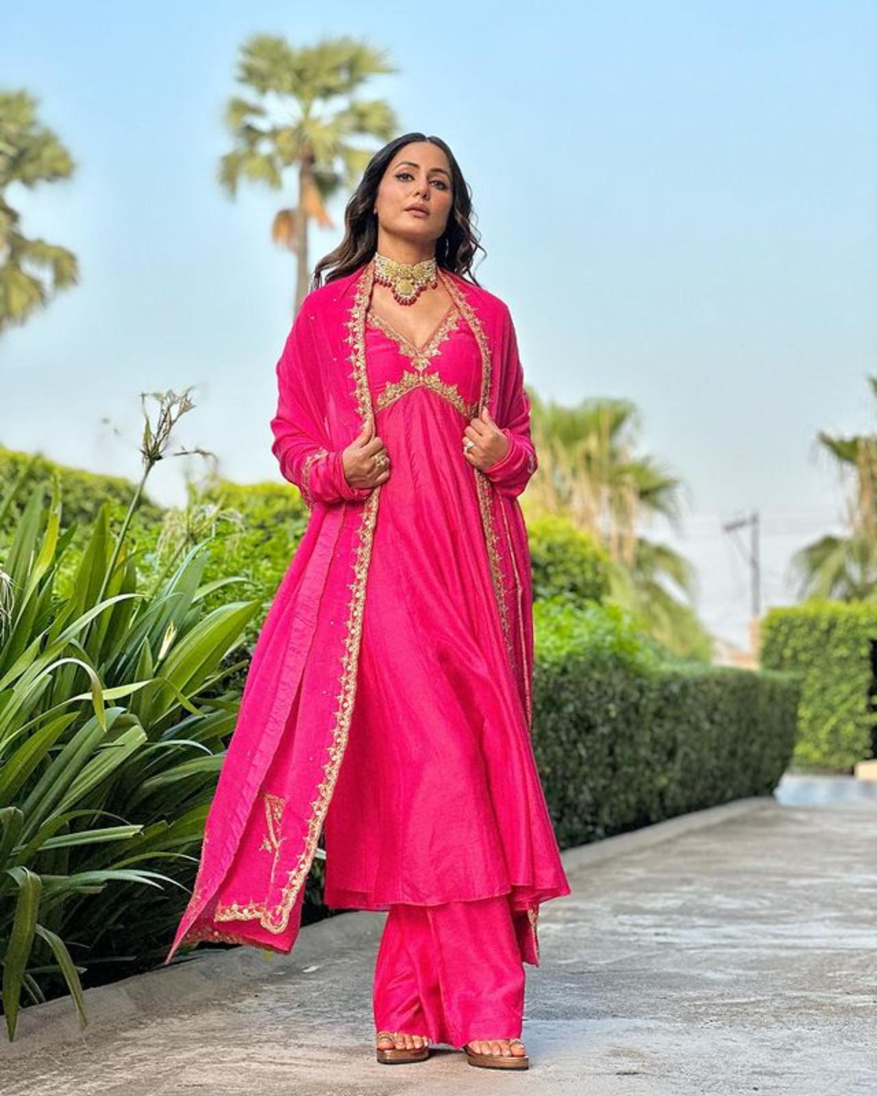 It is never a bad idea to go for solid colours. Here, Hina chose pink for her desi fit