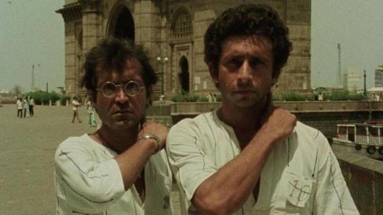 Kundan Shah's indie film tracks its quirky, sincere heroes across Mumbai - from their modest studio in the coastal Haji Ali region, through newspaper headquarters, construction zones, and police stations - offering a wide-ranging exploration of the city's pervasive network of corruption. This makes the final scene where they pose against the Gateway of India mock-slicing their throats iconic in its satirical expression - and also a metaphor for the realities of the lowest classes of Mumbai when they go up against the most powerful