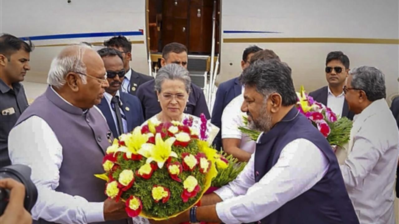 Sources said Congress is keen that the chairperson should be from the party as it is the largest party in the grouping
In Pic: Karnataka Dy CM DK Shivakumar welcomes Congress President Mallikarjun Kharge and party's former president Sonia Gandhi on their arrival at HAL airport
 