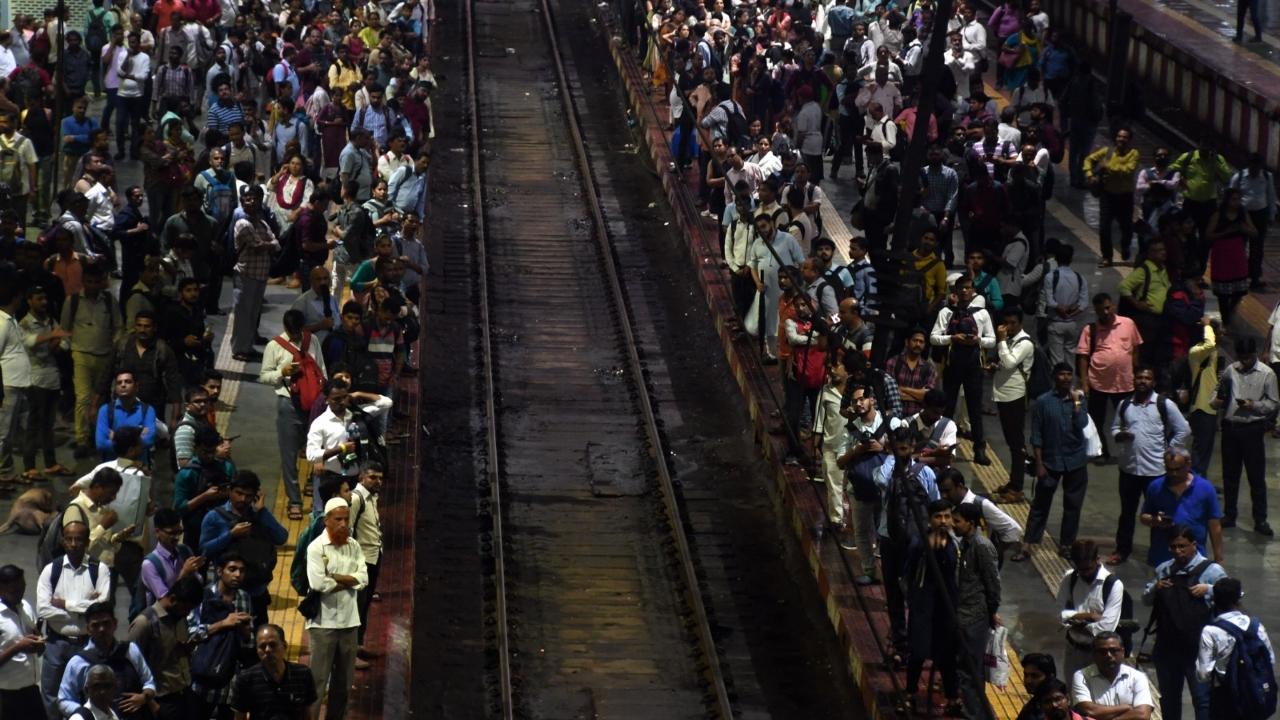 Commuters waiting for the local trains at CSMT station on Friday
 
