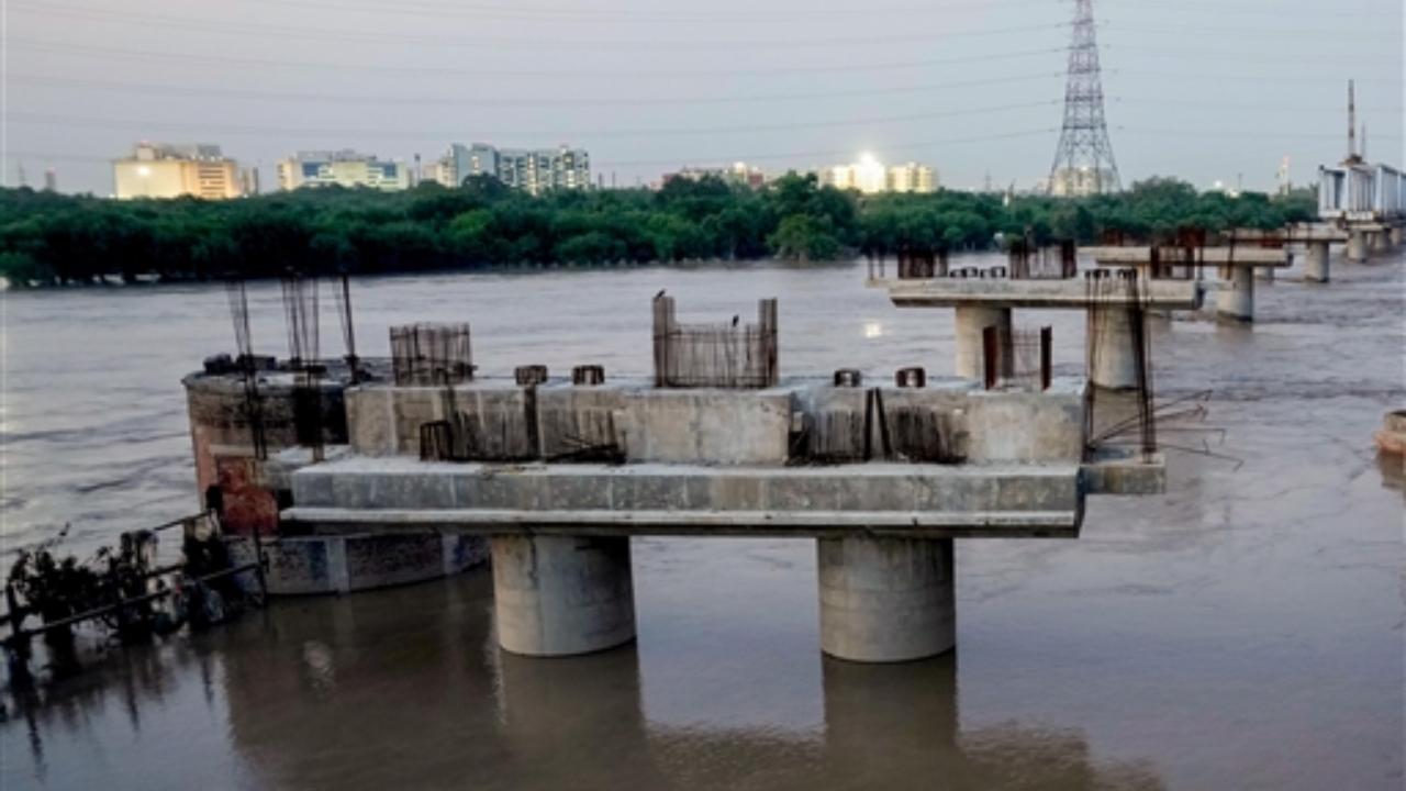 IN PHOTOS: Yamuna River flows slightly above danger mark at 205.81 metres