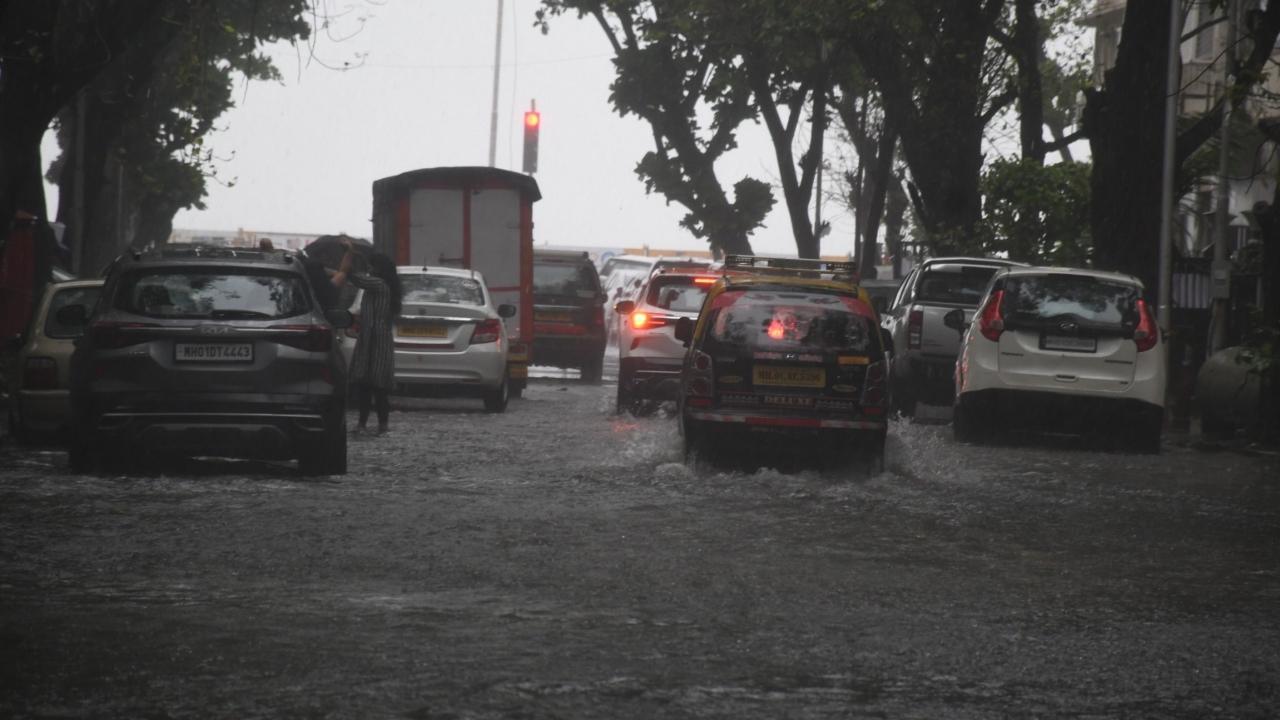 Water from the track is pumped onto the road, resulting in waterlogging of the road at Marine Lines
 