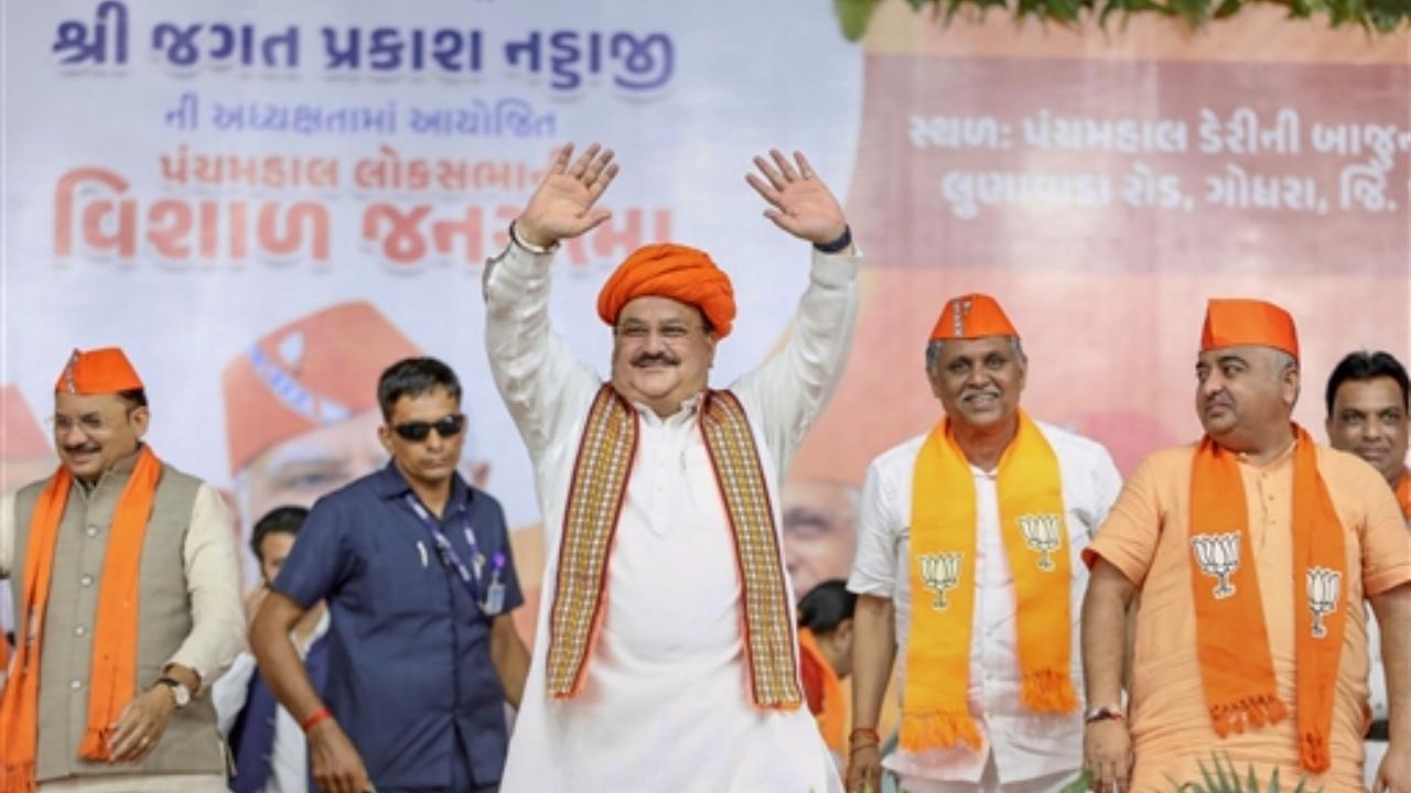 BJP National President JP Nadda with party leaders at a public meeting, in Godhra (PTI)