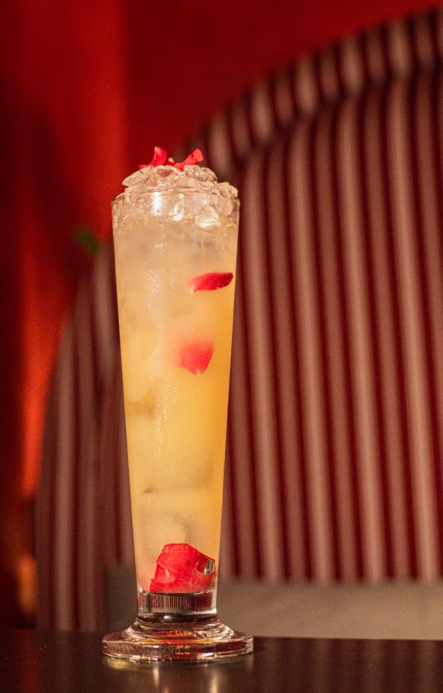 Mix 30 ml Absolut vodka, 20 ml Pandan tequila, 30 ml Litchi puree, 15 ml Homemade Jasmine tea syrup, 15 ml Lime juice, 5 dashes Rose water, 60 ml soda and serve