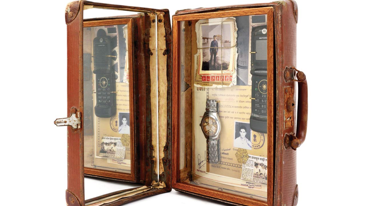 Memory Suitcase, the exhibit showcasing the personal possessions of trainee engineer Mohan Redkar who lost his life saving four people from drowning; the Mahindra Veerta Award is instituted in his honour.  Pic/Mahindra Archives