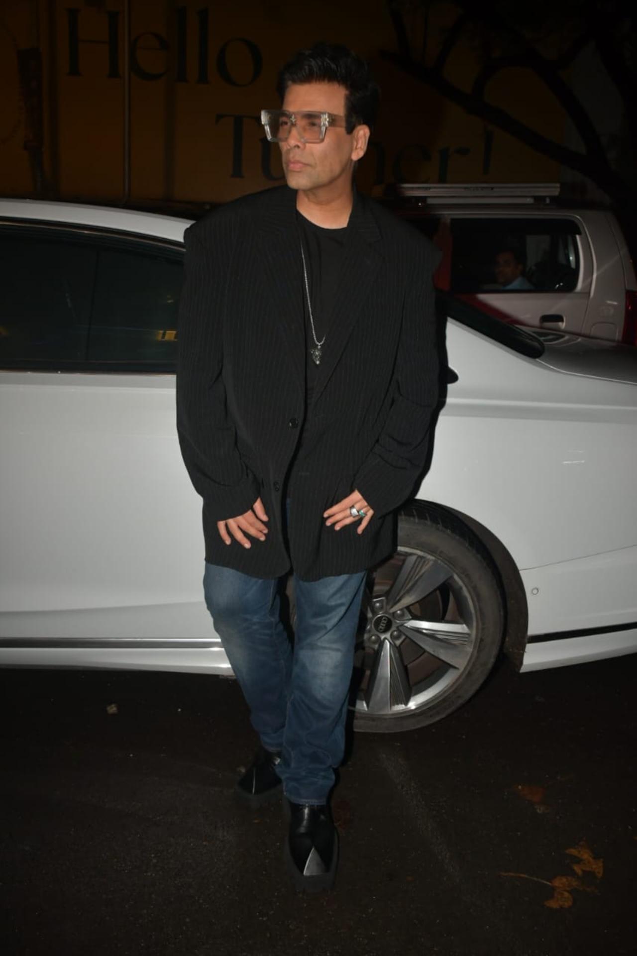 Karan Johar is undoubtedly a pap favourite. The filmmaker struck a pose for the paps before heading into the party