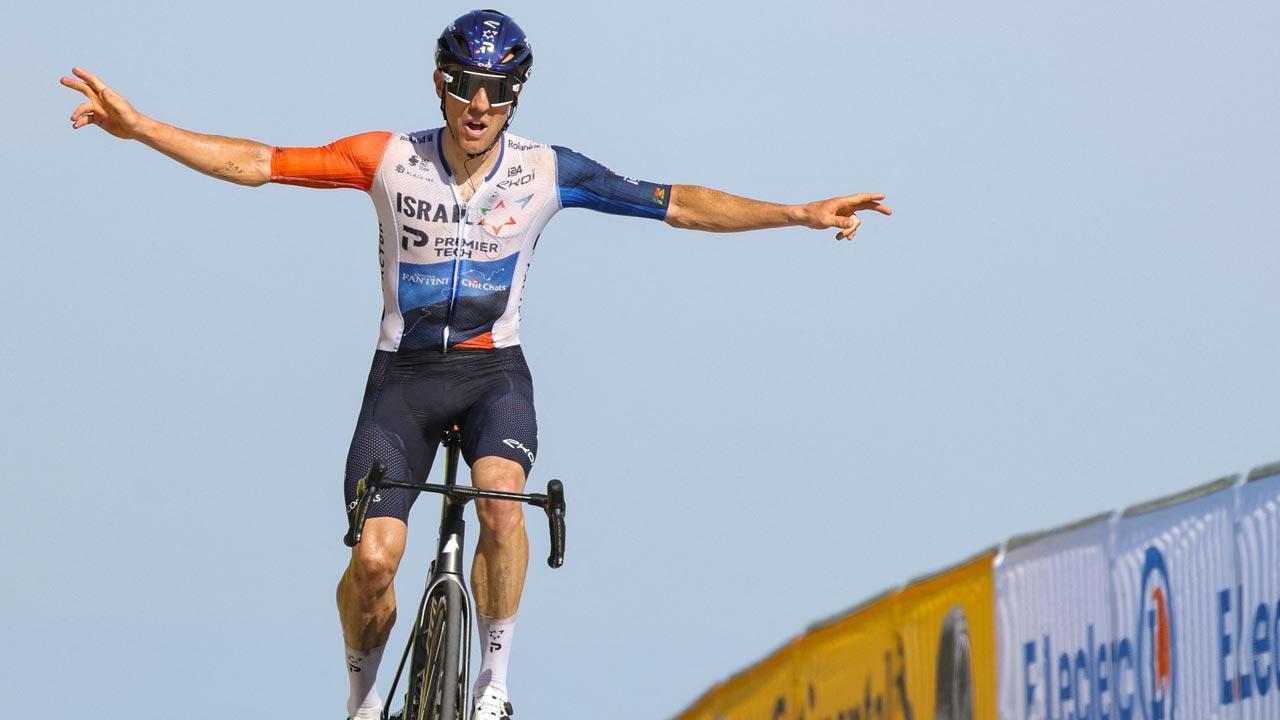 Woods climbs to Stage 9 win, Vingegaard in lead