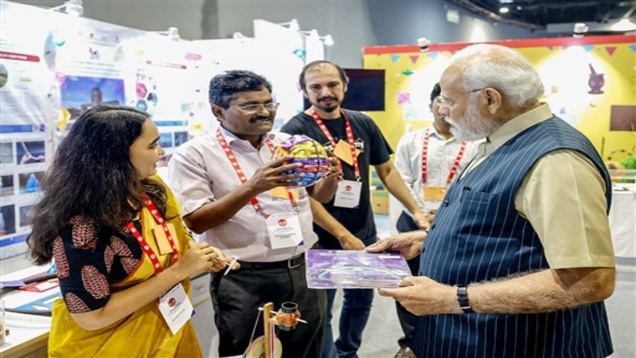 Prime Minister Narendra Modi on Saturday visited an exhibition ahead of the inauguration of Akhil Bhartiya Shiksha Samagam, being held here to mark the three years of the launch of the new National Education Policy (NEP). Photos: PTI/ANI