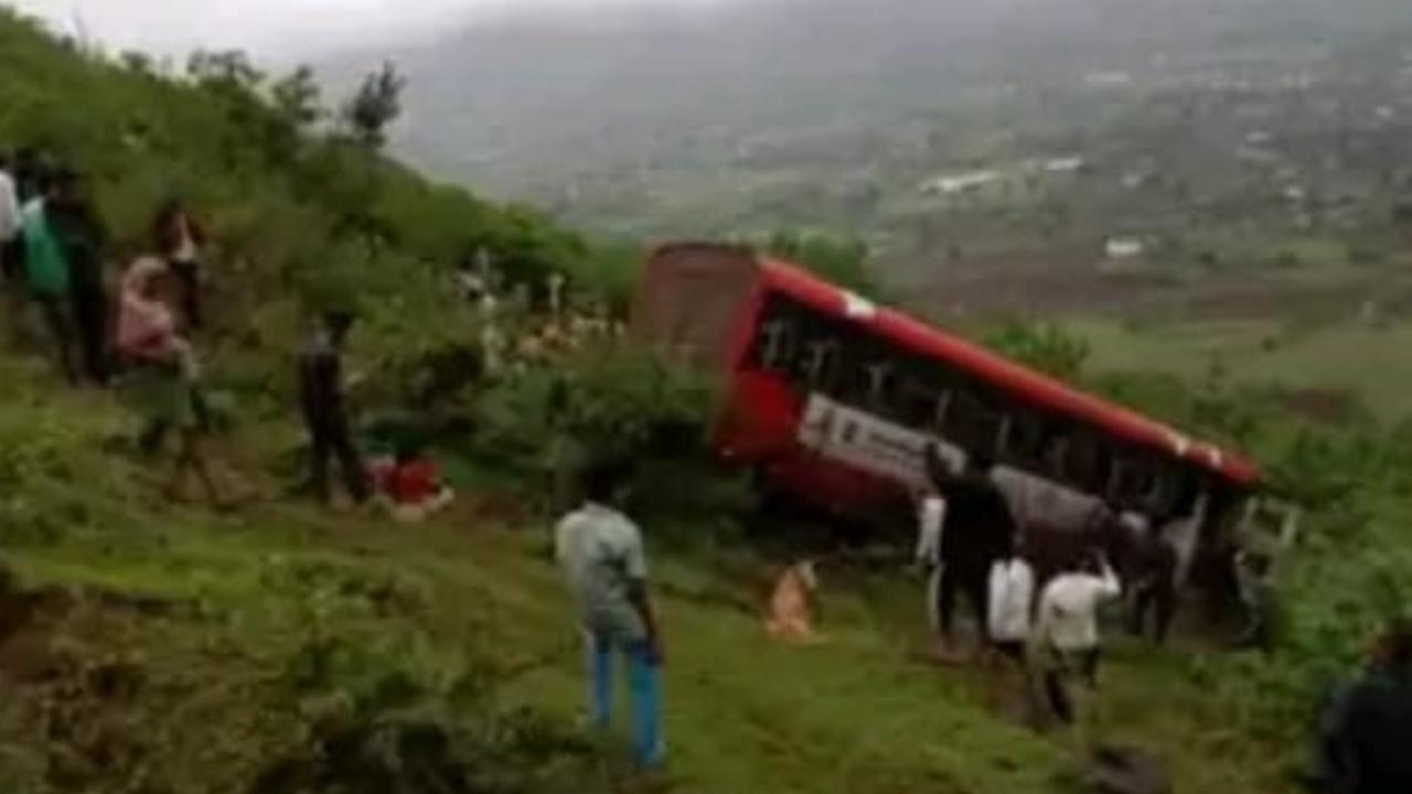 A woman died and 19 persons, including the driver and conductor of the bus, sustained injuries in the accident, an official said