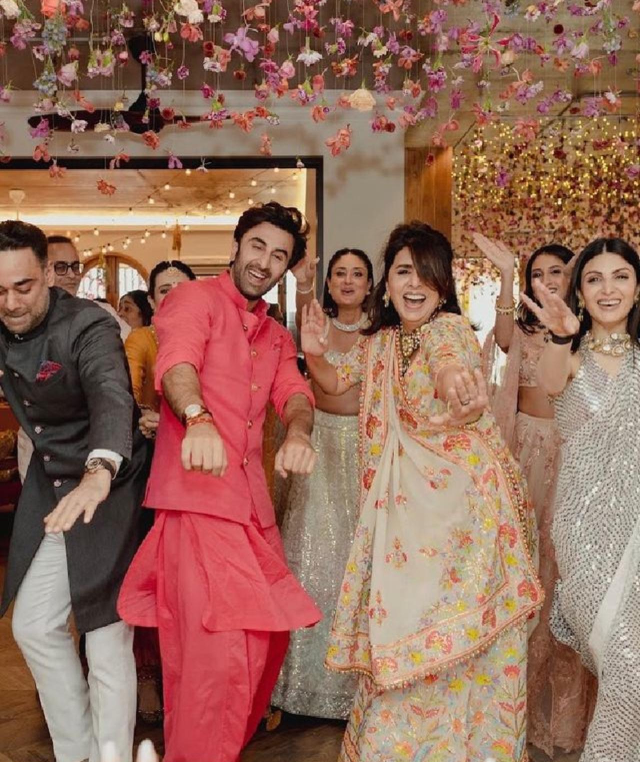 This still from Ranbir Kapoor's wedding shows Neetu Kapoor dancing with joy. She looks very happy in the photograph
