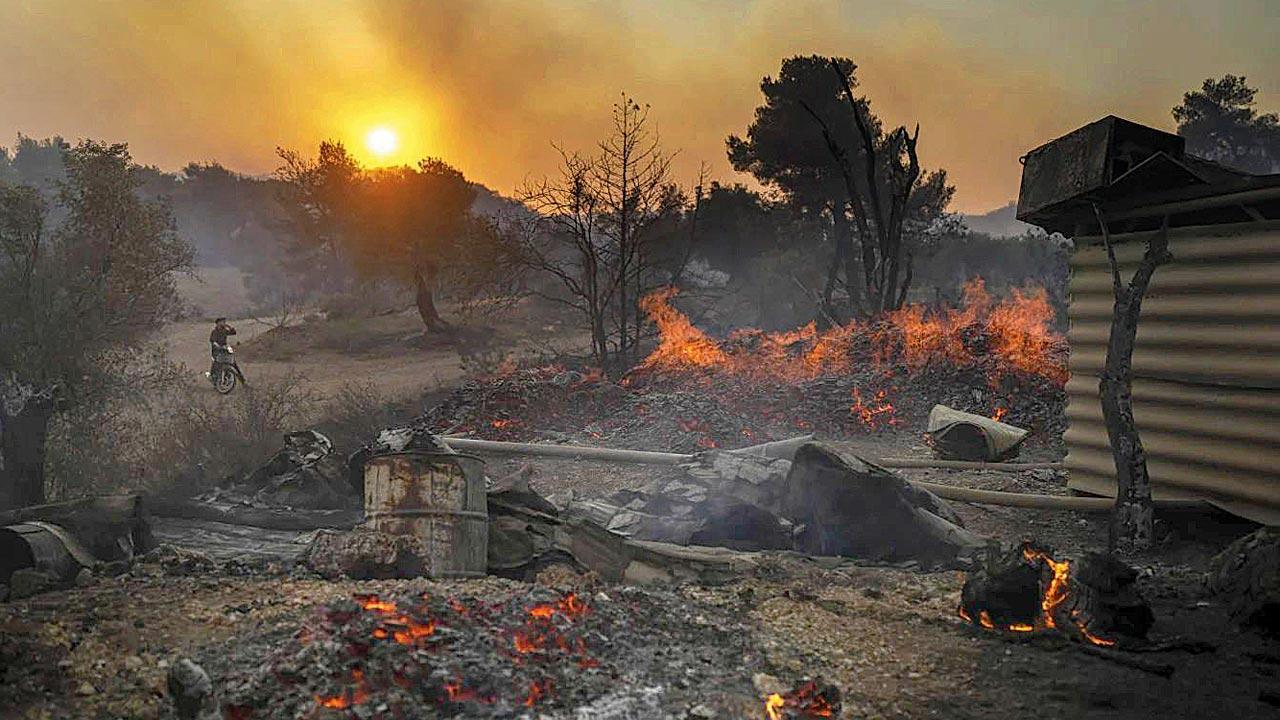 Over 19,000 evacuated in Greece as wildfires rage on