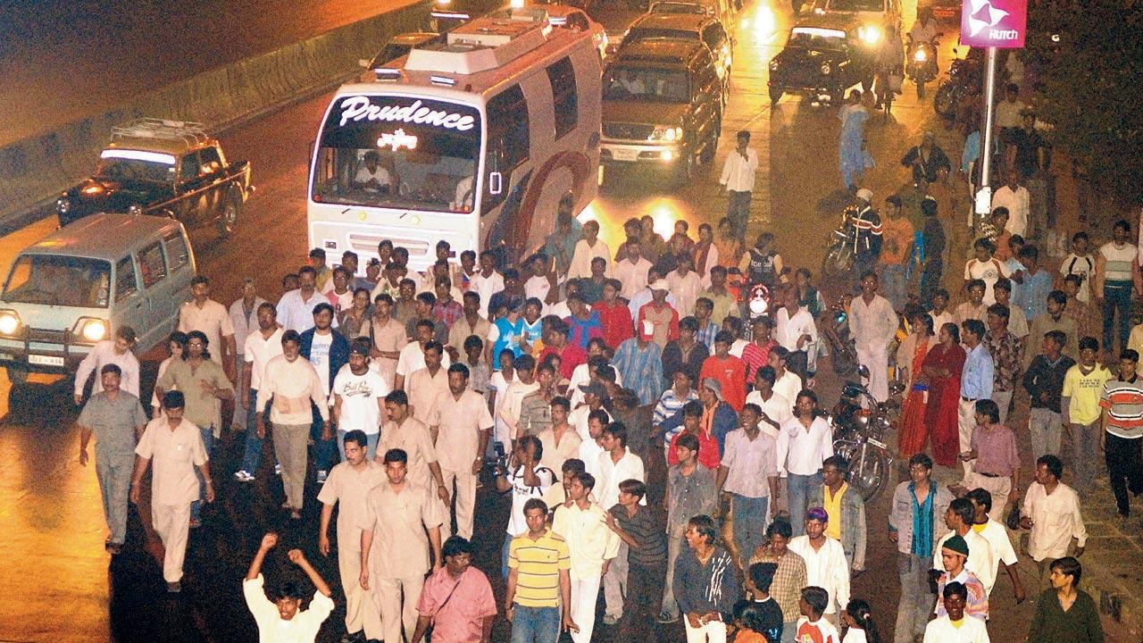 Veteran photographer Mukesh Parpiani says celebrity photography was not staged back in the day. Photographers relied on  exclusive tip-offs to trace the presence of stars. When he was photo editor at mid-day, he calls bagging this midnight picture of Amitabh Bacchan walking to Siddhivinayak mandir in 2007. File photo/mid-day