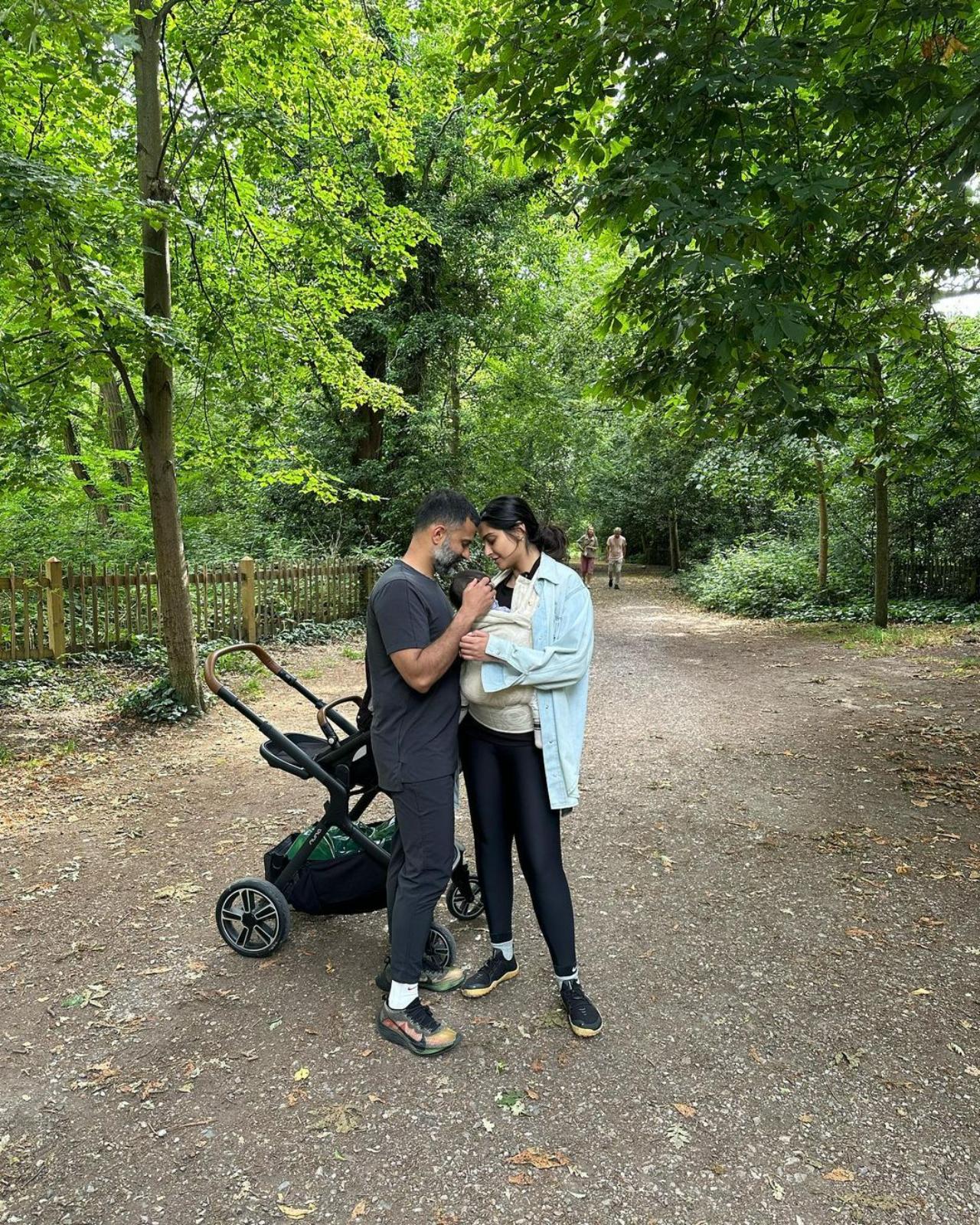 The Kapoor-Ahuja family are out on a nature walk! Sonam and Anand are comfortably dressed as they caress their son, Vayu