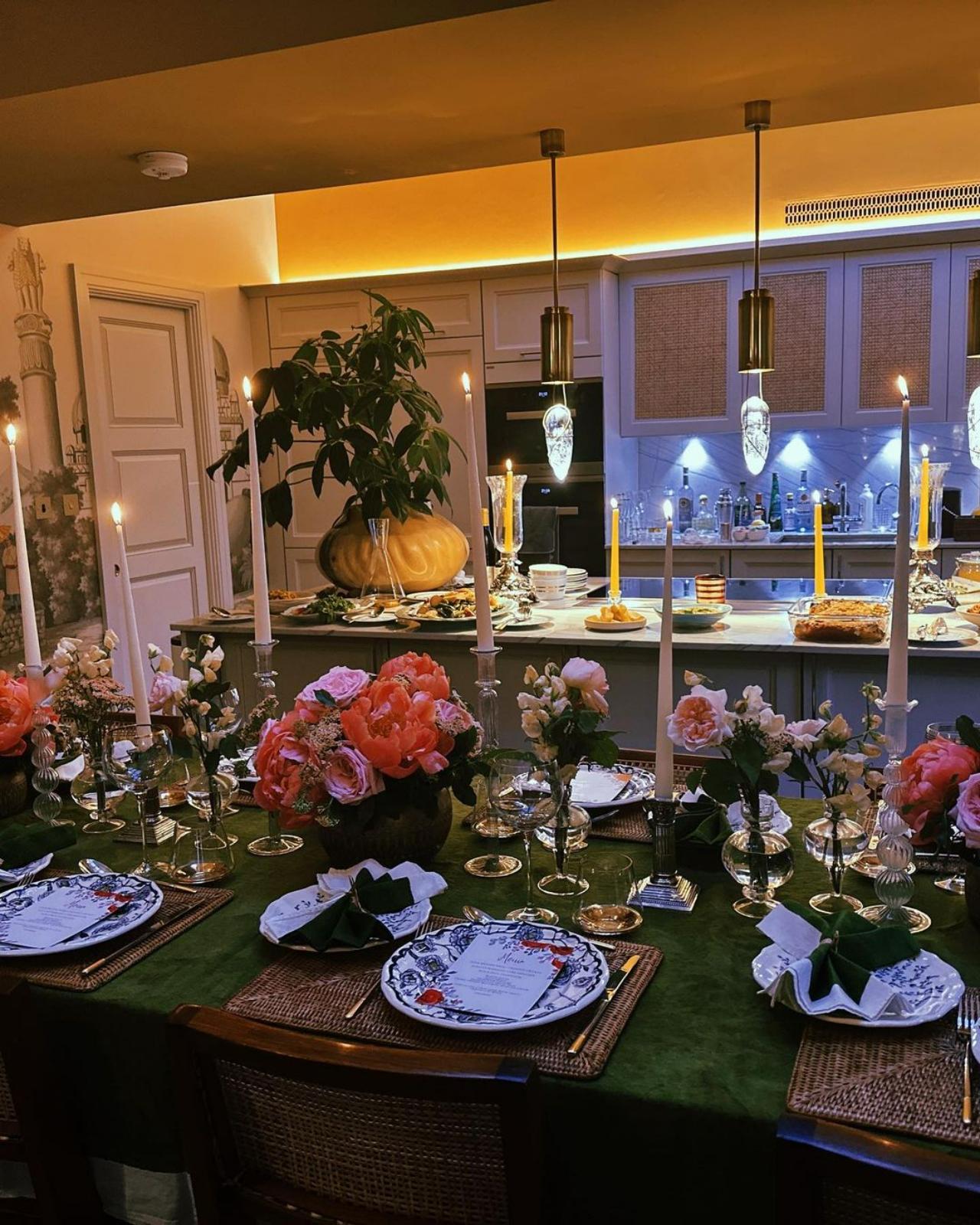 Table set for...twenty? The table is beautiful decorated in fresh florals, handcrafted menus and candles to set the ambience. Are we invited? Please say yes
