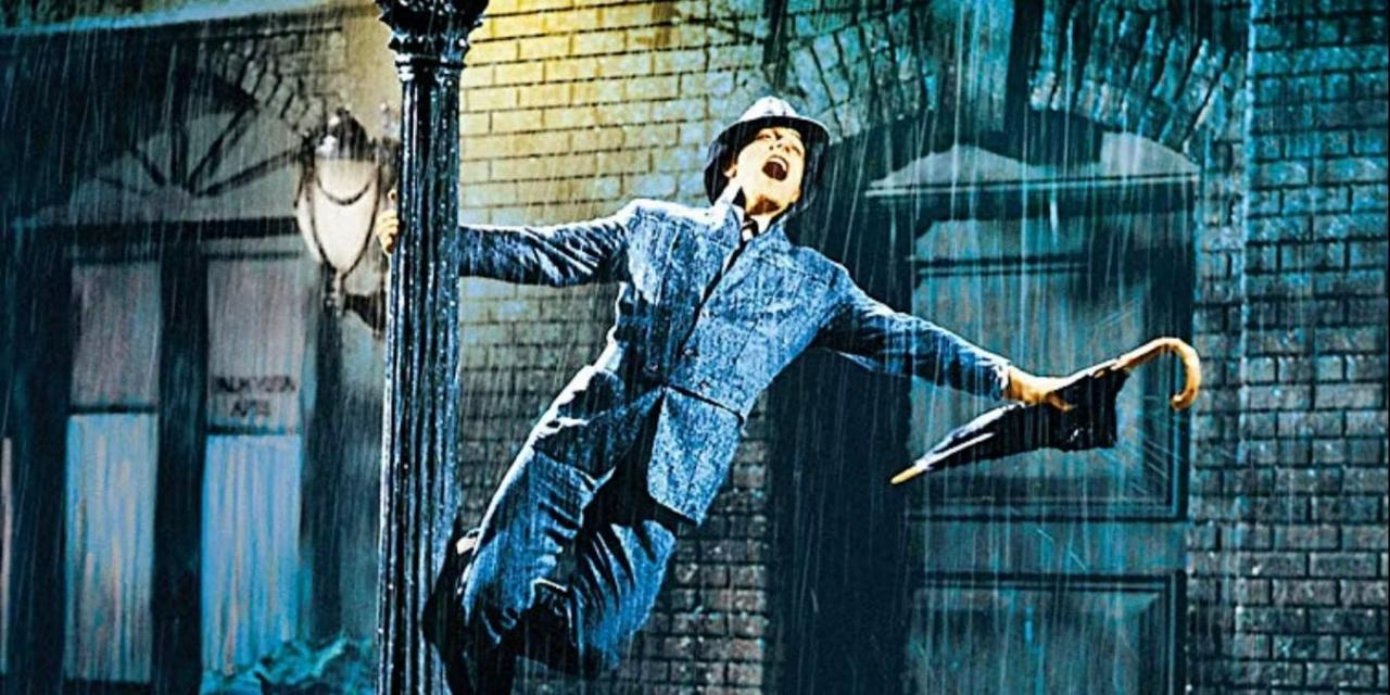 Singin' In The Rain
How can we forget this classic? After Don and Kathy finally confess their feelings to each other, what follows is a tap-dancing sequences complete with umbrella-twirling, lamppost-hanging and puddle-splashing. Well, who isn't crazy when they're in love?