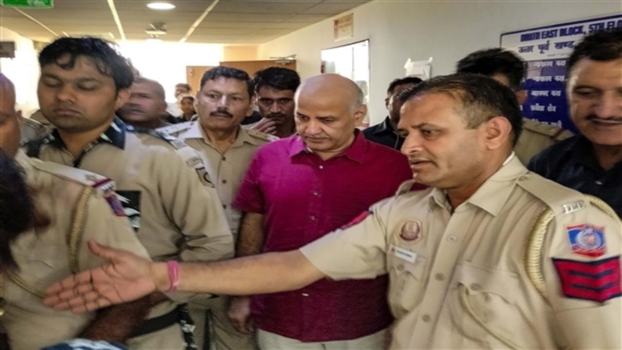 Delhi's Former Deputy CM Manish Sisodia was produced physically in the Rouse Avenue court for the hearing of a money laundering case related to the Delhi excise policy. The court had directed him to appear physically. Photos: ANI/PTI/File