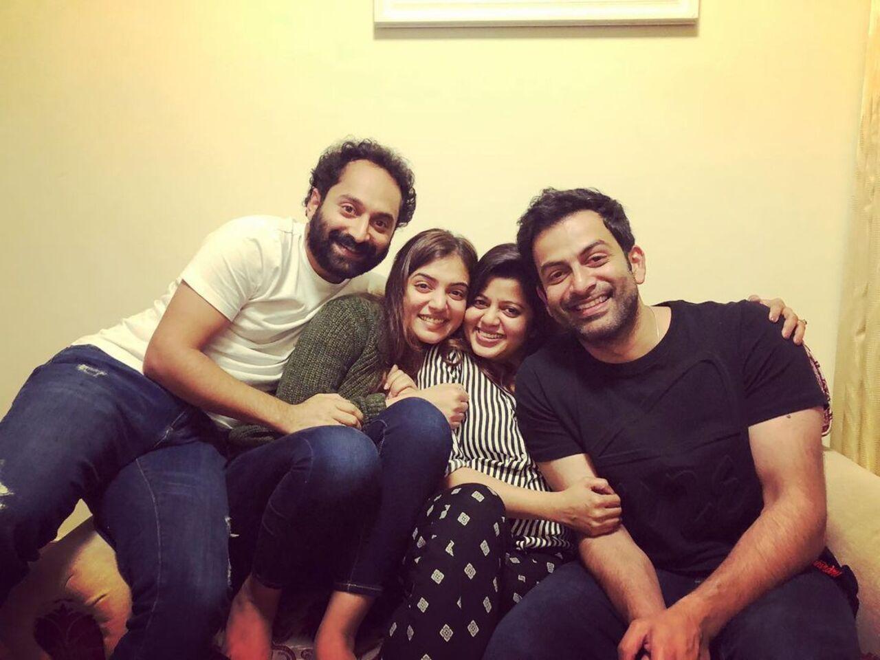 Nazriya and Fahadh who are married to each other pose with Prithviraj and his wife Supriya